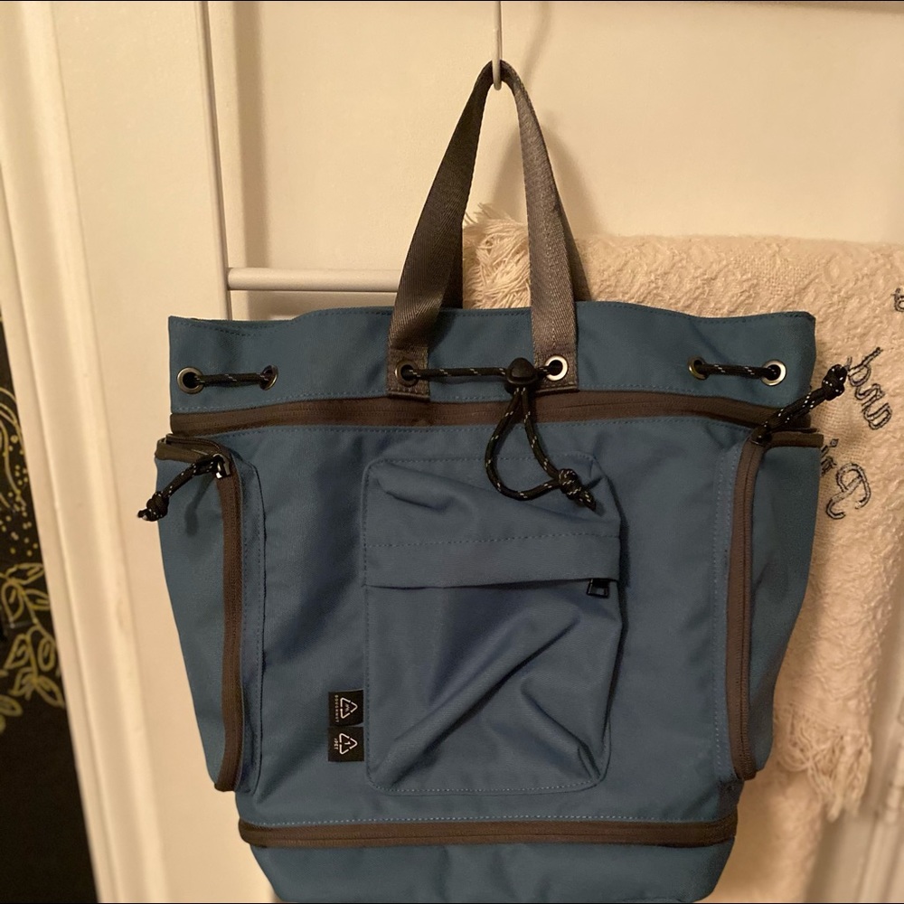 Free people recycled bucket backpack.